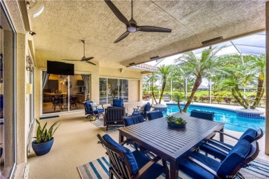 Nestled on a serene one-acre lot along the 6th fairway of on Evergreen Club in Florida - for sale on GolfHomes.com, golf home, golf lot