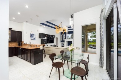 Nestled on a serene one-acre lot along the 6th fairway of on Evergreen Club in Florida - for sale on GolfHomes.com, golf home, golf lot