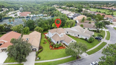 Don't miss your chance to own a 5 bedroom 3.5 bath in the HIGHLY on Champions Club at Summerfield in Florida - for sale on GolfHomes.com, golf home, golf lot
