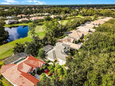 One or more photo(s) has been virtually staged. Experience on The Legacy Club At Alaqua Lakes in Florida - for sale on GolfHomes.com, golf home, golf lot