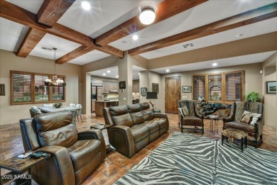 Experience luxurious living offered TURNKEY FURNISHED, (artwork on Superstition Mountain Club - Lost Gold in Arizona - for sale on GolfHomes.com, golf home, golf lot