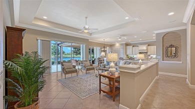 Positioned on a premier south-facing homesite with serene lake on Ritz-Carlton Members Golf Club in Florida - for sale on GolfHomes.com, golf home, golf lot