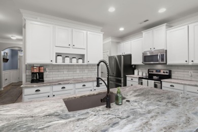 This stunning two-story home combines timeless Lowcountry charm on Cypress Point Par 3 in South Carolina - for sale on GolfHomes.com, golf home, golf lot