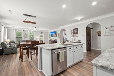 This stunning two-story home combines timeless Lowcountry charm on Cypress Point Par 3 in South Carolina - for sale on GolfHomes.com, golf home, golf lot