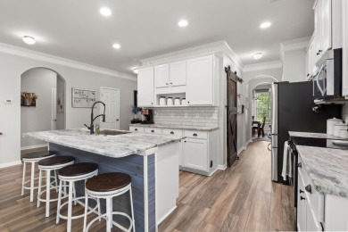 This stunning two-story home combines timeless Lowcountry charm on Cypress Point Par 3 in South Carolina - for sale on GolfHomes.com, golf home, golf lot