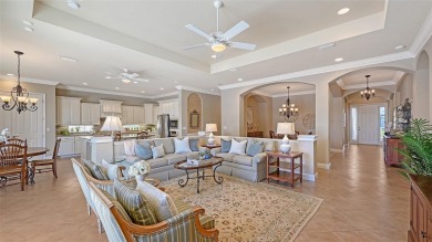 Positioned on a premier south-facing homesite with serene lake on Ritz-Carlton Members Golf Club in Florida - for sale on GolfHomes.com, golf home, golf lot