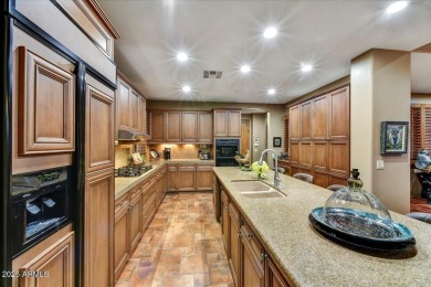 Experience luxurious living offered TURNKEY FURNISHED, (artwork on Superstition Mountain Club - Lost Gold in Arizona - for sale on GolfHomes.com, golf home, golf lot