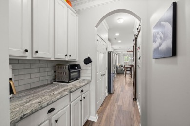 This stunning two-story home combines timeless Lowcountry charm on Cypress Point Par 3 in South Carolina - for sale on GolfHomes.com, golf home, golf lot