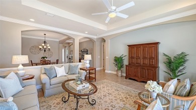 Positioned on a premier south-facing homesite with serene lake on Ritz-Carlton Members Golf Club in Florida - for sale on GolfHomes.com, golf home, golf lot
