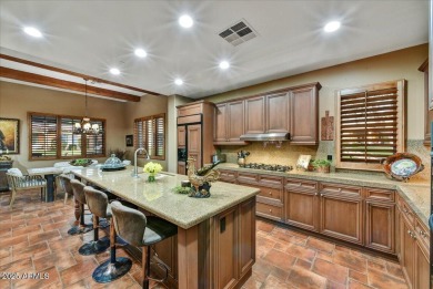 Experience luxurious living offered TURNKEY FURNISHED, (artwork on Superstition Mountain Club - Lost Gold in Arizona - for sale on GolfHomes.com, golf home, golf lot