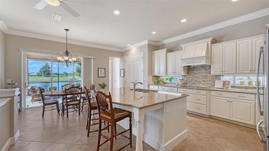 Positioned on a premier south-facing homesite with serene lake on Ritz-Carlton Members Golf Club in Florida - for sale on GolfHomes.com, golf home, golf lot
