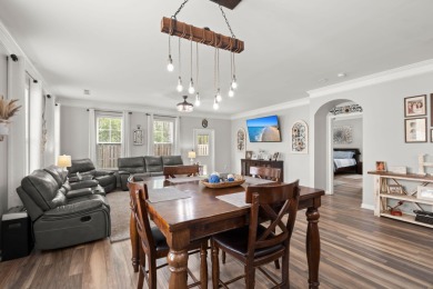 This stunning two-story home combines timeless Lowcountry charm on Cypress Point Par 3 in South Carolina - for sale on GolfHomes.com, golf home, golf lot