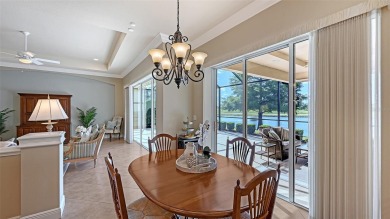 Positioned on a premier south-facing homesite with serene lake on Ritz-Carlton Members Golf Club in Florida - for sale on GolfHomes.com, golf home, golf lot