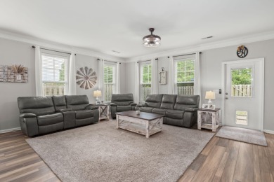 This stunning two-story home combines timeless Lowcountry charm on Cypress Point Par 3 in South Carolina - for sale on GolfHomes.com, golf home, golf lot