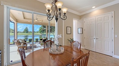 Positioned on a premier south-facing homesite with serene lake on Ritz-Carlton Members Golf Club in Florida - for sale on GolfHomes.com, golf home, golf lot