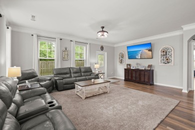 This stunning two-story home combines timeless Lowcountry charm on Cypress Point Par 3 in South Carolina - for sale on GolfHomes.com, golf home, golf lot