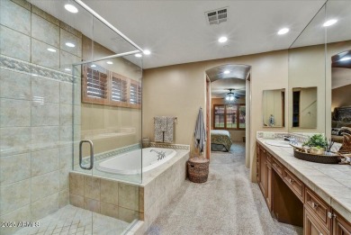 Experience luxurious living offered TURNKEY FURNISHED, (artwork on Superstition Mountain Club - Lost Gold in Arizona - for sale on GolfHomes.com, golf home, golf lot