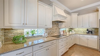 Positioned on a premier south-facing homesite with serene lake on Ritz-Carlton Members Golf Club in Florida - for sale on GolfHomes.com, golf home, golf lot