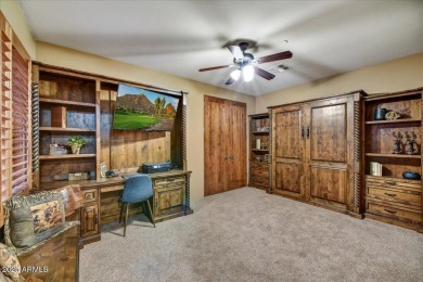 Experience luxurious living offered TURNKEY FURNISHED, (artwork on Superstition Mountain Club - Lost Gold in Arizona - for sale on GolfHomes.com, golf home, golf lot