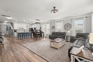 This stunning two-story home combines timeless Lowcountry charm on Cypress Point Par 3 in South Carolina - for sale on GolfHomes.com, golf home, golf lot