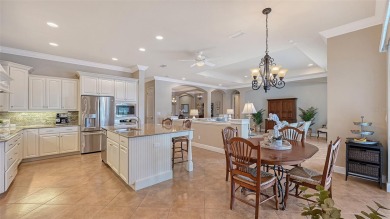 Positioned on a premier south-facing homesite with serene lake on Ritz-Carlton Members Golf Club in Florida - for sale on GolfHomes.com, golf home, golf lot