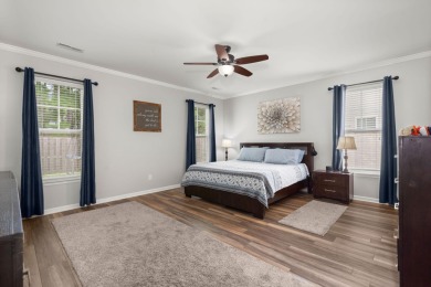 This stunning two-story home combines timeless Lowcountry charm on Cypress Point Par 3 in South Carolina - for sale on GolfHomes.com, golf home, golf lot