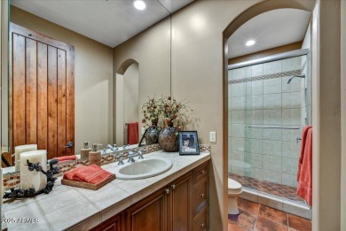 Experience luxurious living offered TURNKEY FURNISHED, (artwork on Superstition Mountain Club - Lost Gold in Arizona - for sale on GolfHomes.com, golf home, golf lot