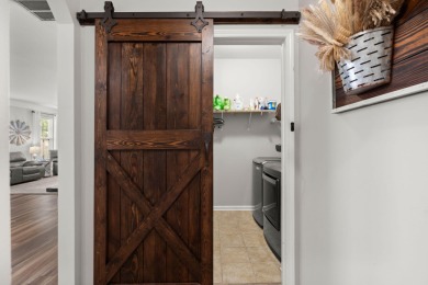 This stunning two-story home combines timeless Lowcountry charm on Cypress Point Par 3 in South Carolina - for sale on GolfHomes.com, golf home, golf lot