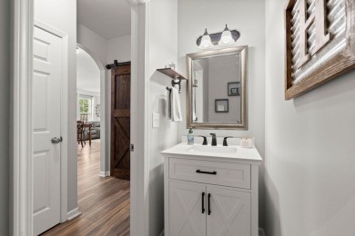 This stunning two-story home combines timeless Lowcountry charm on Cypress Point Par 3 in South Carolina - for sale on GolfHomes.com, golf home, golf lot