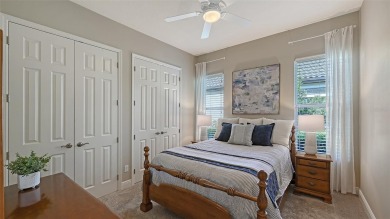 Positioned on a premier south-facing homesite with serene lake on Ritz-Carlton Members Golf Club in Florida - for sale on GolfHomes.com, golf home, golf lot