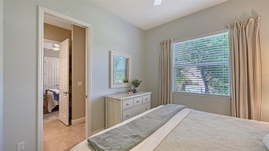 Positioned on a premier south-facing homesite with serene lake on Ritz-Carlton Members Golf Club in Florida - for sale on GolfHomes.com, golf home, golf lot