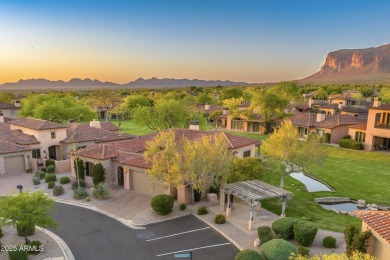 Experience luxurious living offered TURNKEY FURNISHED, (artwork on Superstition Mountain Club - Lost Gold in Arizona - for sale on GolfHomes.com, golf home, golf lot