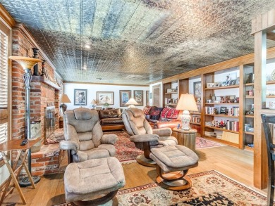 Discover the epitome of luxury living in this meticulously on Shawnee Country Club in Oklahoma - for sale on GolfHomes.com, golf home, golf lot