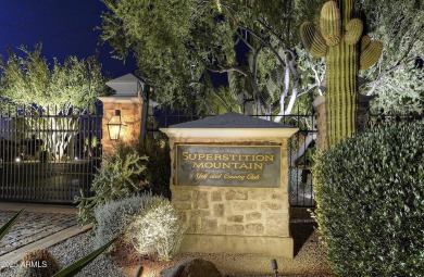 Experience luxurious living offered TURNKEY FURNISHED, (artwork on Superstition Mountain Club - Lost Gold in Arizona - for sale on GolfHomes.com, golf home, golf lot