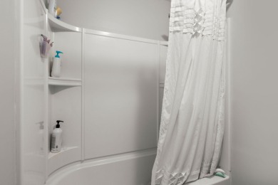 This stunning two-story home combines timeless Lowcountry charm on Cypress Point Par 3 in South Carolina - for sale on GolfHomes.com, golf home, golf lot