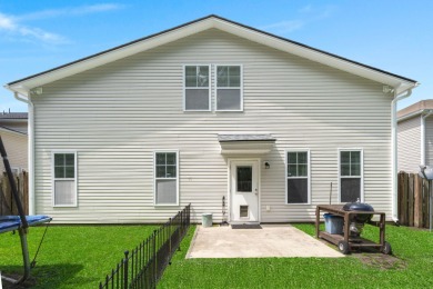 This stunning two-story home combines timeless Lowcountry charm on Cypress Point Par 3 in South Carolina - for sale on GolfHomes.com, golf home, golf lot