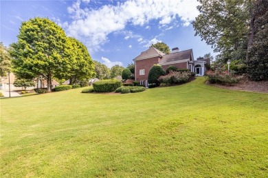 You drive up the hill and there it is, an all-brick beauty on Polo Golf and Country Club in Georgia - for sale on GolfHomes.com, golf home, golf lot