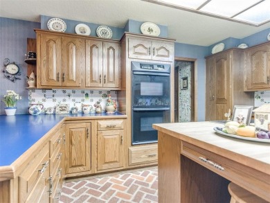 Discover the epitome of luxury living in this meticulously on Shawnee Country Club in Oklahoma - for sale on GolfHomes.com, golf home, golf lot