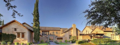 Experience luxurious living offered TURNKEY FURNISHED, (artwork on Superstition Mountain Club - Lost Gold in Arizona - for sale on GolfHomes.com, golf home, golf lot