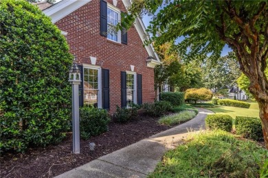 You drive up the hill and there it is, an all-brick beauty on Polo Golf and Country Club in Georgia - for sale on GolfHomes.com, golf home, golf lot