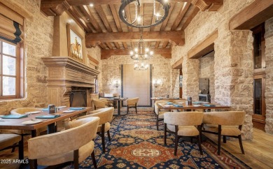 Experience luxurious living offered TURNKEY FURNISHED, (artwork on Superstition Mountain Club - Lost Gold in Arizona - for sale on GolfHomes.com, golf home, golf lot
