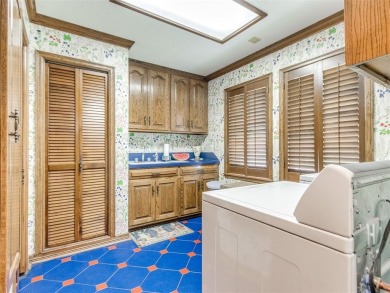 Discover the epitome of luxury living in this meticulously on Shawnee Country Club in Oklahoma - for sale on GolfHomes.com, golf home, golf lot
