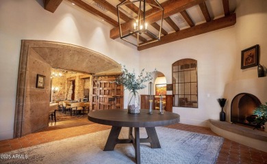 Experience luxurious living offered TURNKEY FURNISHED, (artwork on Superstition Mountain Club - Lost Gold in Arizona - for sale on GolfHomes.com, golf home, golf lot
