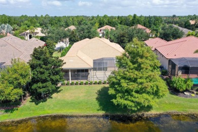 Positioned on a premier south-facing homesite with serene lake on Ritz-Carlton Members Golf Club in Florida - for sale on GolfHomes.com, golf home, golf lot