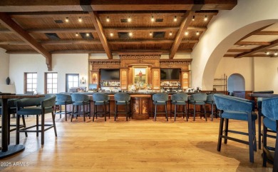 Experience luxurious living offered TURNKEY FURNISHED, (artwork on Superstition Mountain Club - Lost Gold in Arizona - for sale on GolfHomes.com, golf home, golf lot