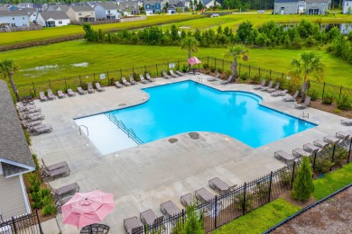This stunning two-story home combines timeless Lowcountry charm on Cypress Point Par 3 in South Carolina - for sale on GolfHomes.com, golf home, golf lot