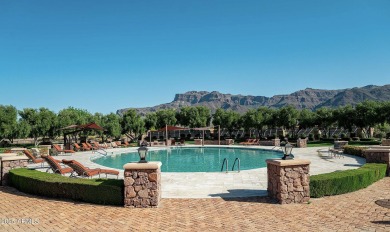 Experience luxurious living offered TURNKEY FURNISHED, (artwork on Superstition Mountain Club - Lost Gold in Arizona - for sale on GolfHomes.com, golf home, golf lot