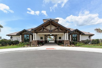 Positioned on a premier south-facing homesite with serene lake on Ritz-Carlton Members Golf Club in Florida - for sale on GolfHomes.com, golf home, golf lot