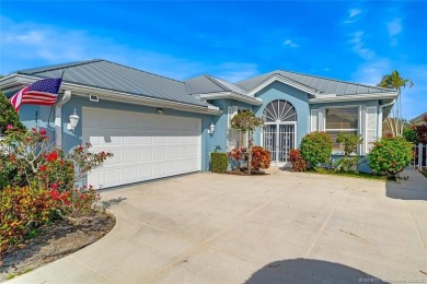 Absolutely Beautiful & stylish LAKEFRONT Divosta built home on Monarch Country Club in Florida - for sale on GolfHomes.com, golf home, golf lot