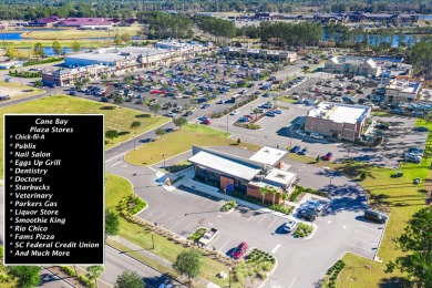 This stunning two-story home combines timeless Lowcountry charm on Cypress Point Par 3 in South Carolina - for sale on GolfHomes.com, golf home, golf lot
